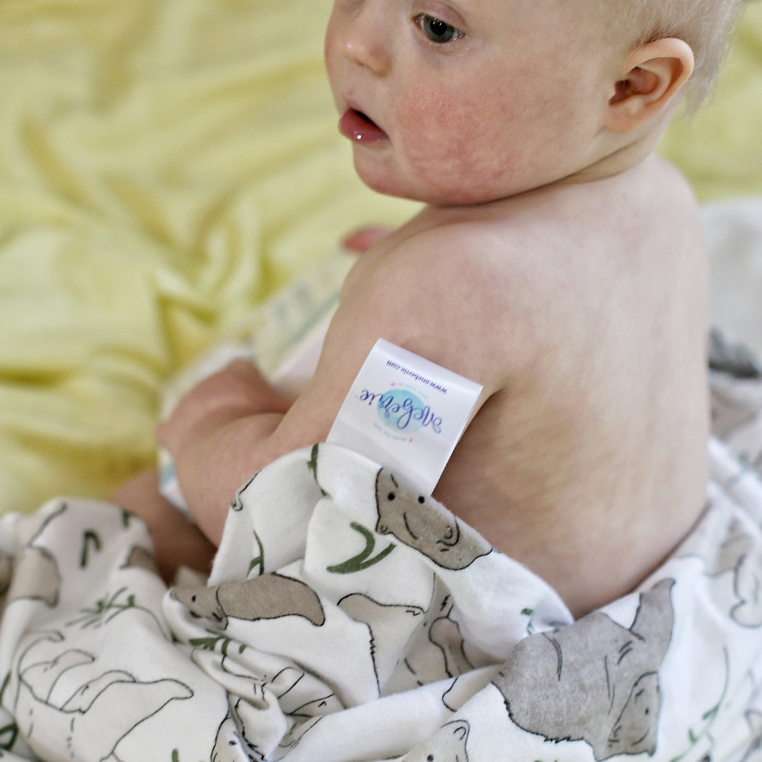 down syndrome boy in a three bear towel