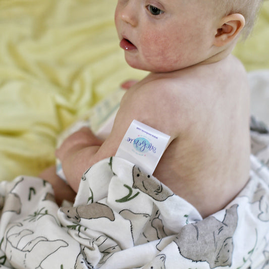 down syndrome boy in a three bear towel