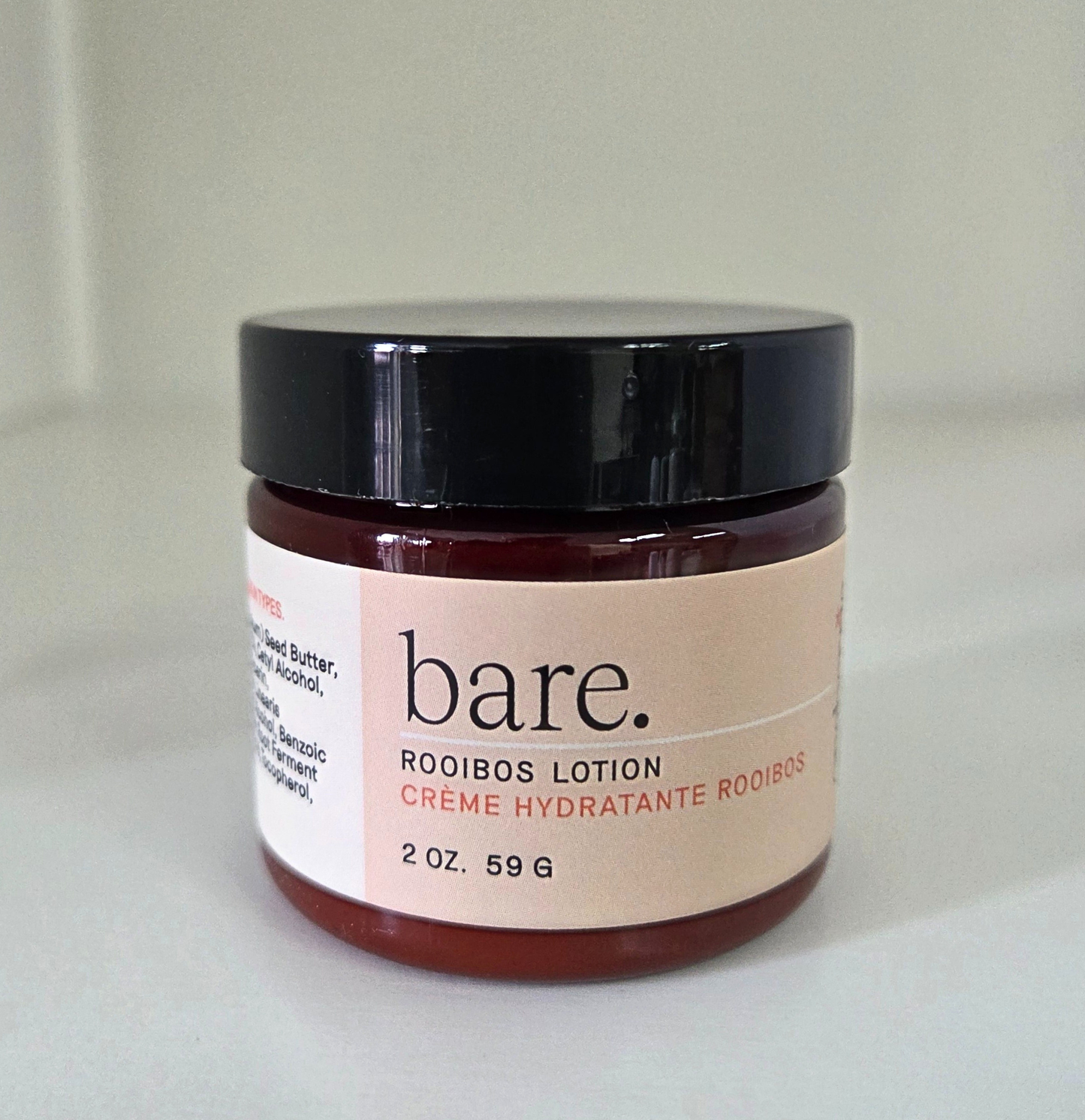 BARE. Rooibos Lotion by Oneberrie — 2oz travel-size amber jar with black lid, front label showing product name in English and French