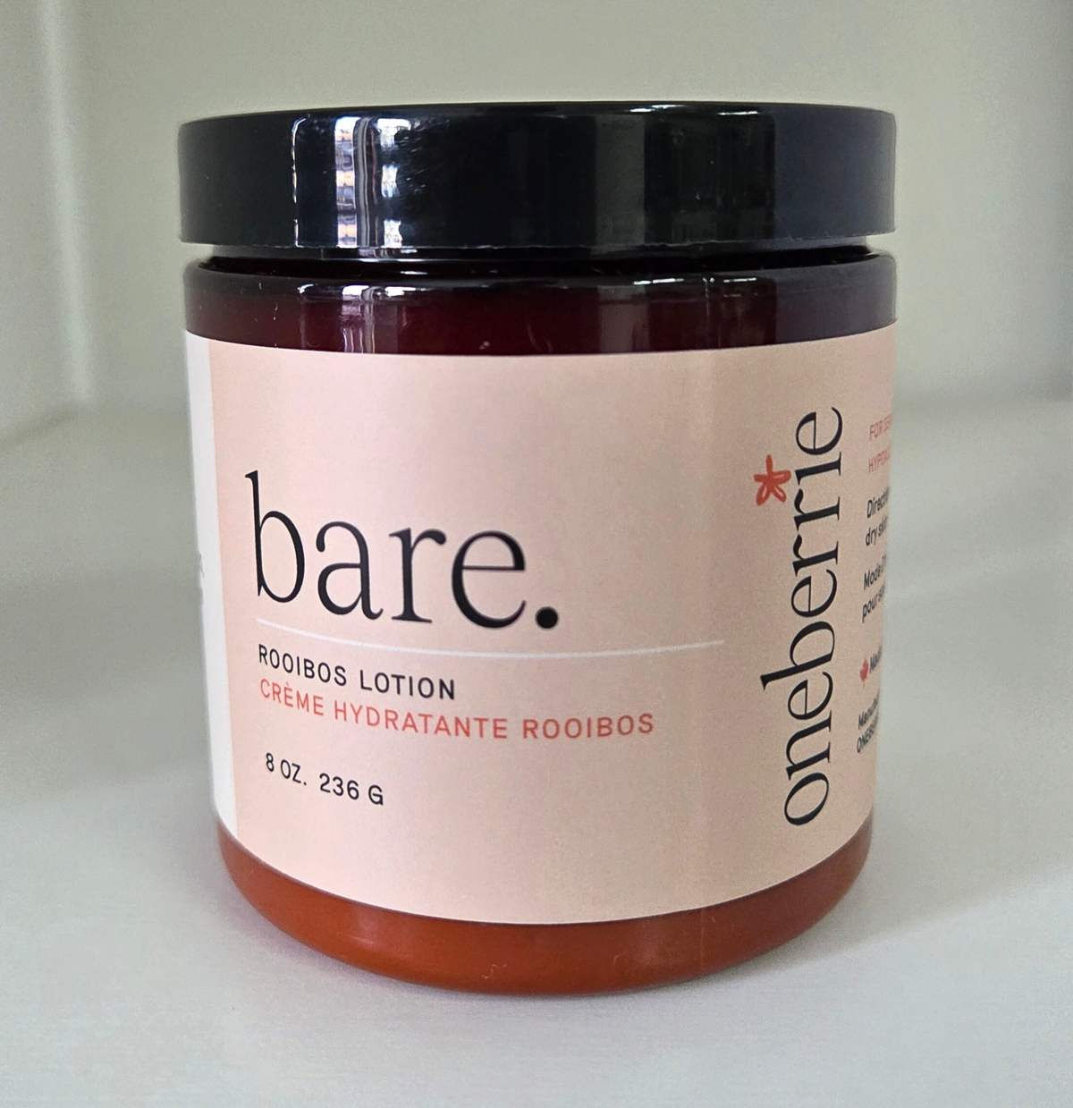 BARE. Rooibos Lotion by Oneberrie — 8oz amber jar with black lid, front label showing product name in English and French