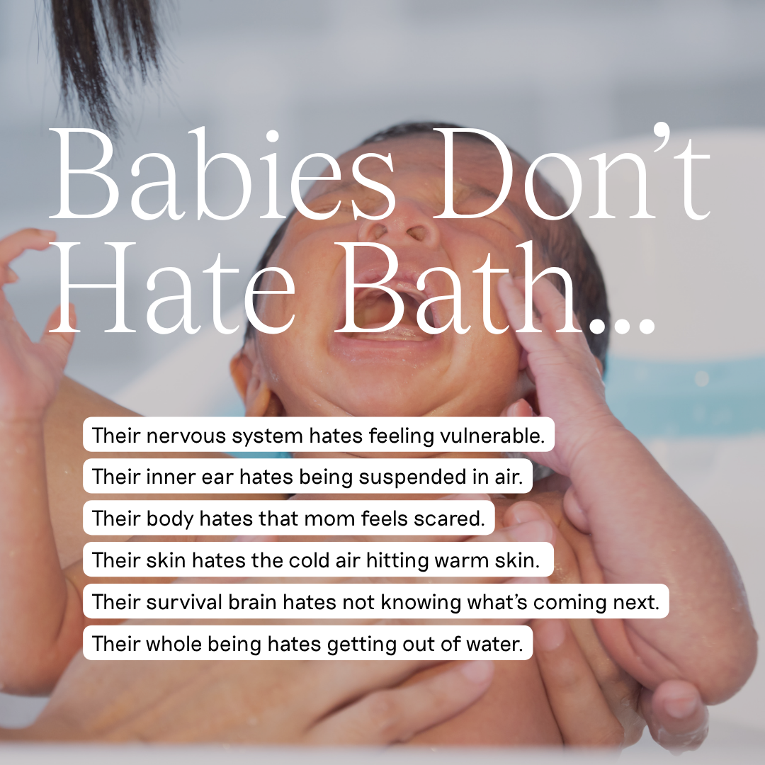 A baby in a bath and crying, is being held by an adult's hands, with large white text reading 'Babies Don't Hate Bath.