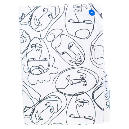 A soft baby towel with a black line drawn faces pattern on a white background