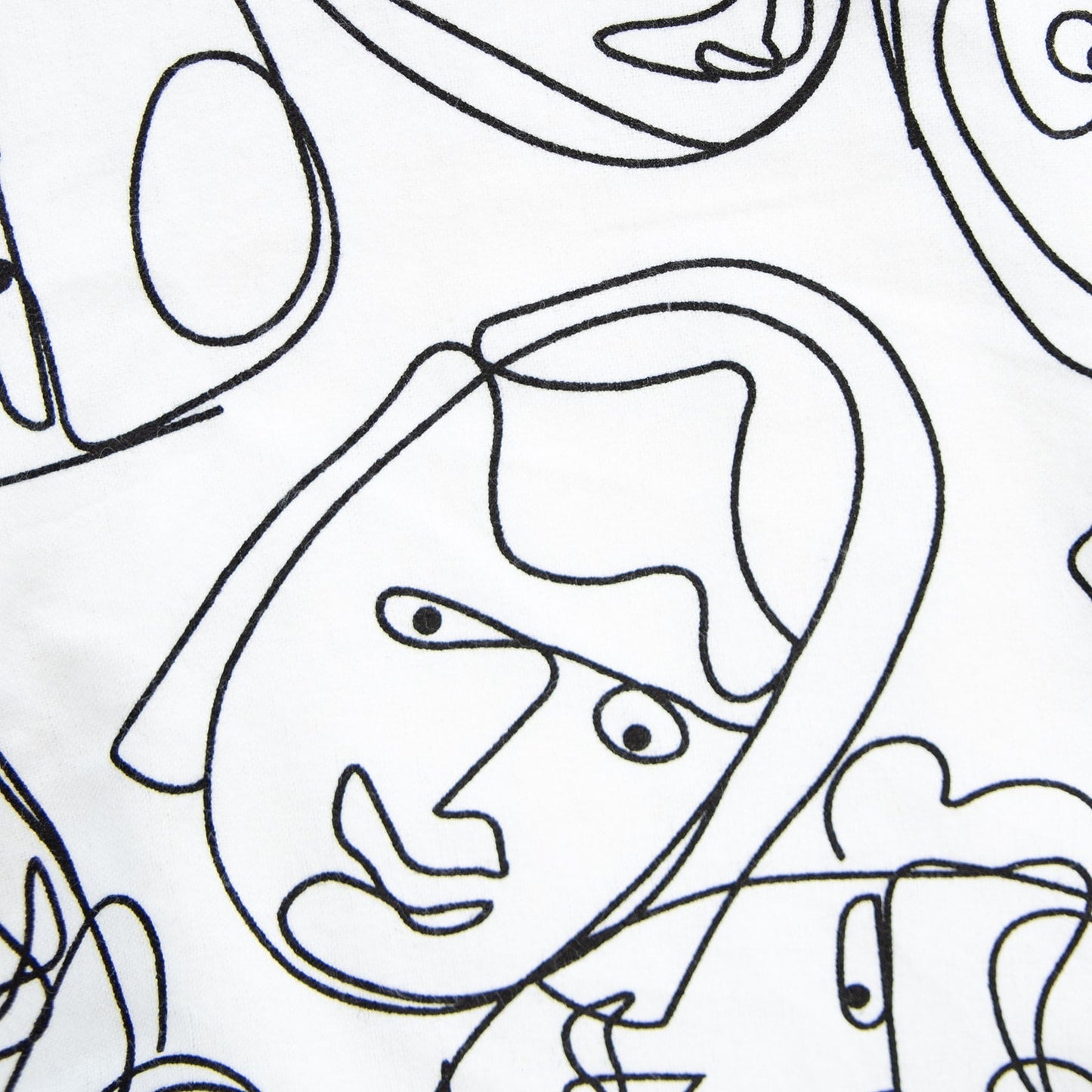Oneberrie Hair Wrap Towel fabric close-up in Graffiti Faces print with continuous black line-drawn abstract faces on white
