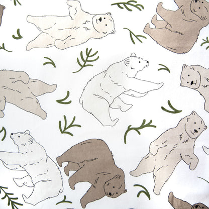 Oneberrie Hair Wrap Towel fabric close-up in Three Bears print with watercolour polar, grizzly and brown bears with green leaves on white
