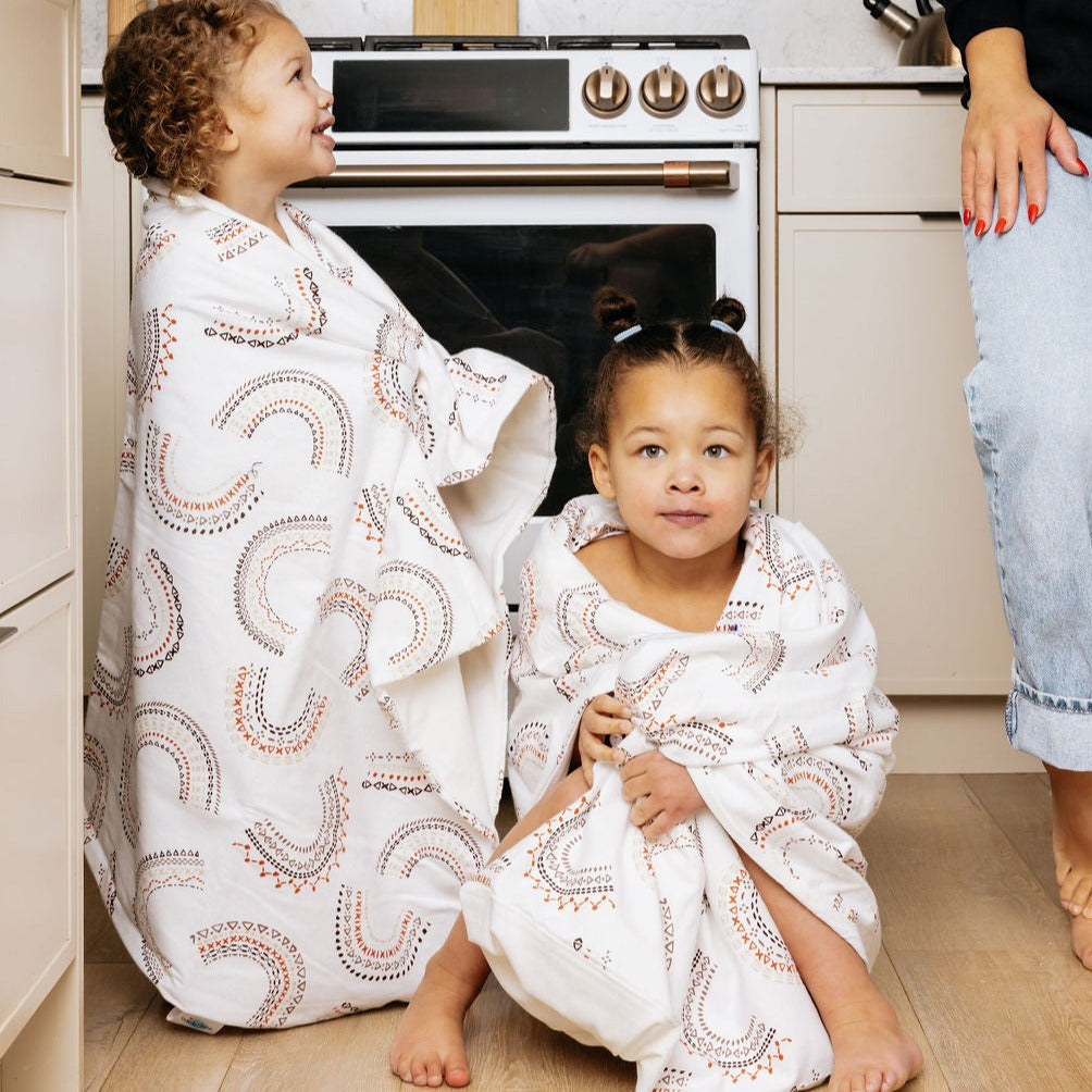 Little girls wrapped in towels 