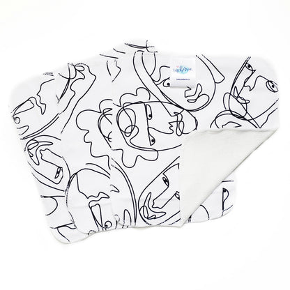 Graffiti print - line faces in black on a white background 